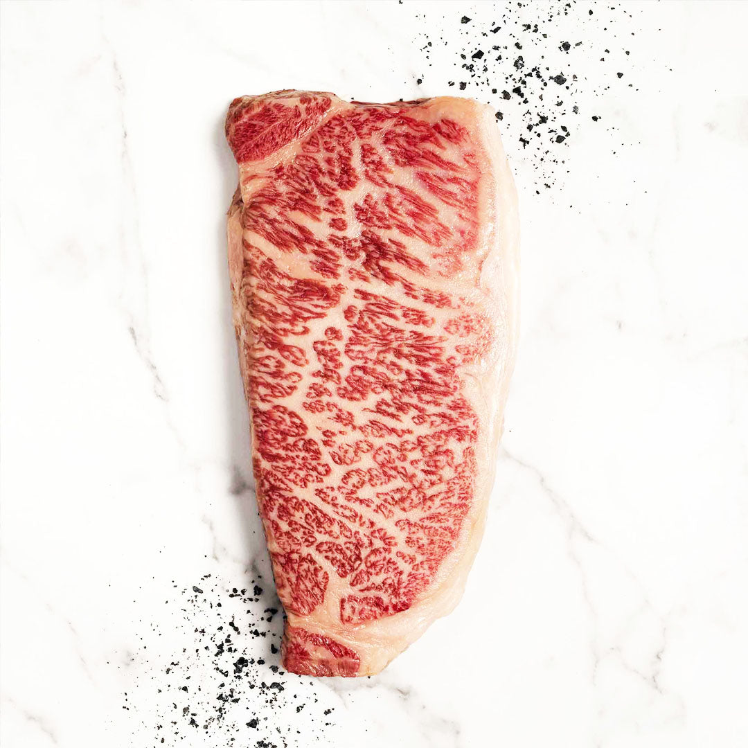 Japanese Wagyu beef with exceptional marbling, rich flavor, and buttery tenderness, offering premium steak cuts for a luxury dining experience.