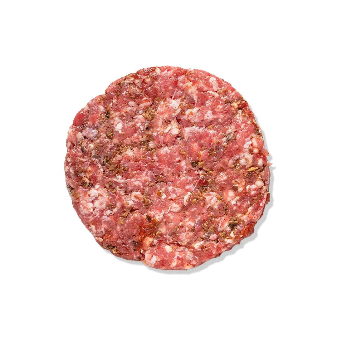 Angus beef truffle burger with brioche bun, melted cheese, caramelized onions, and truffle mayo