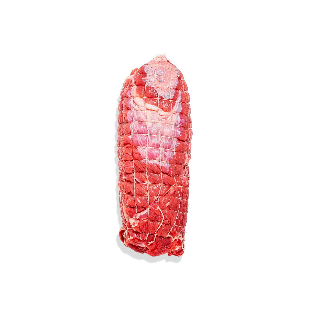 Rolled raw meat on a white background