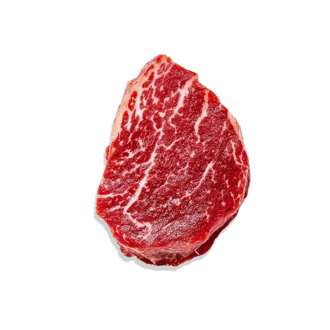 Juicy Angus Tenderloin steak seasoned simply and cooked to medium-rare with rich beef texture