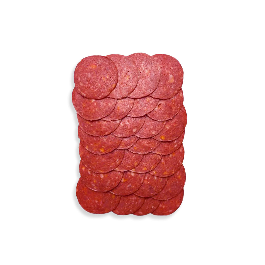 Stack of pepperoni slices on a white background