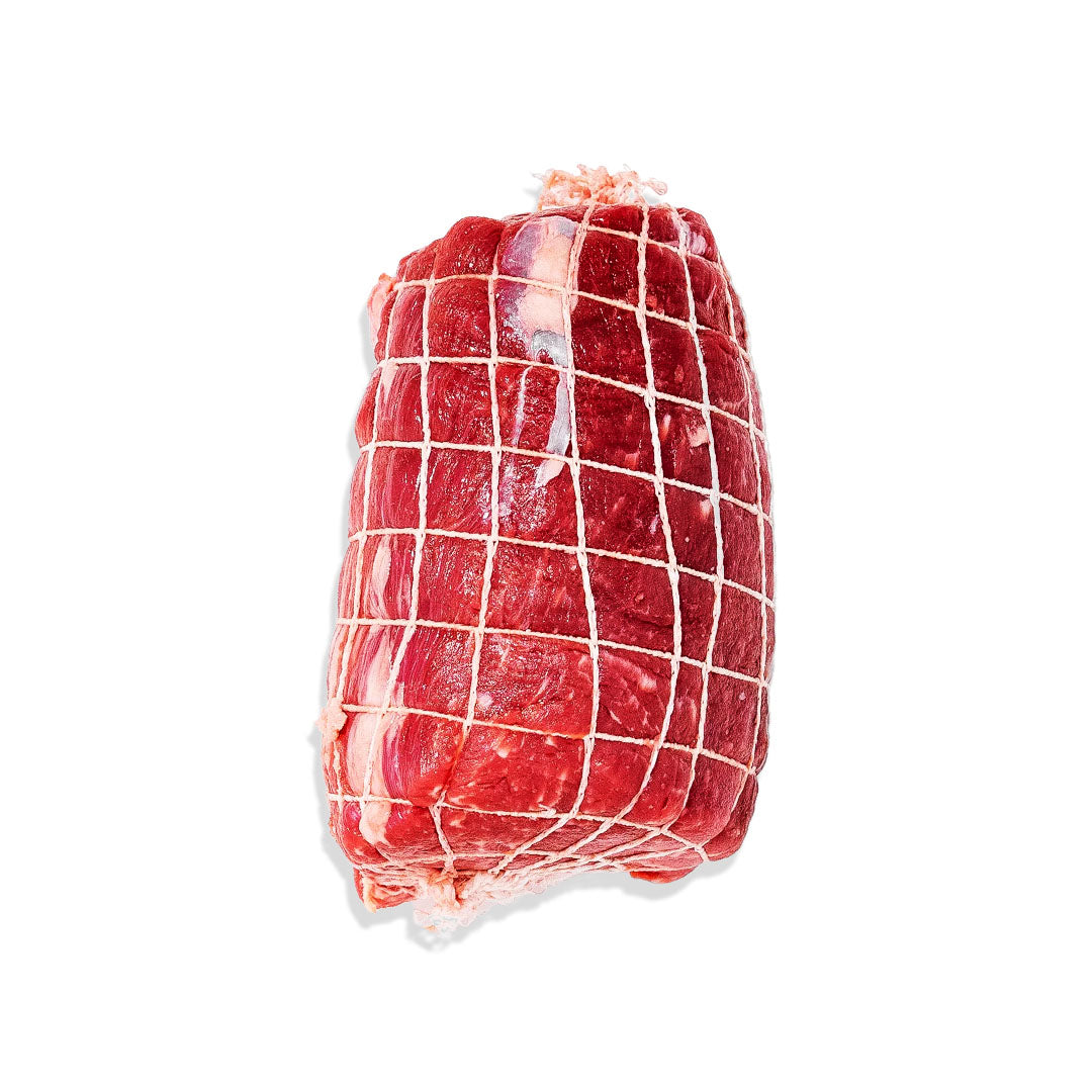 Rolled meat product with grid wrapping on a white background