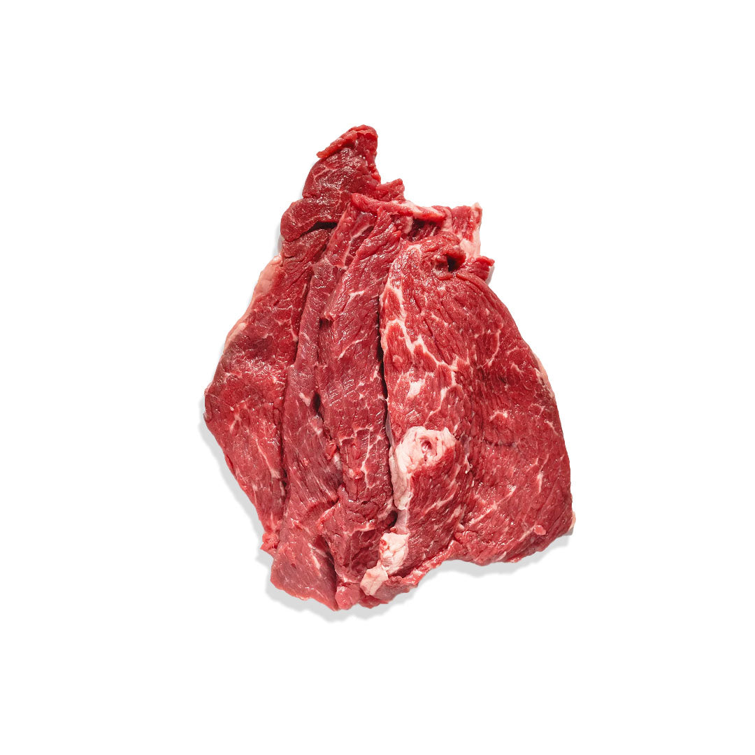 Raw beef steak on a white background