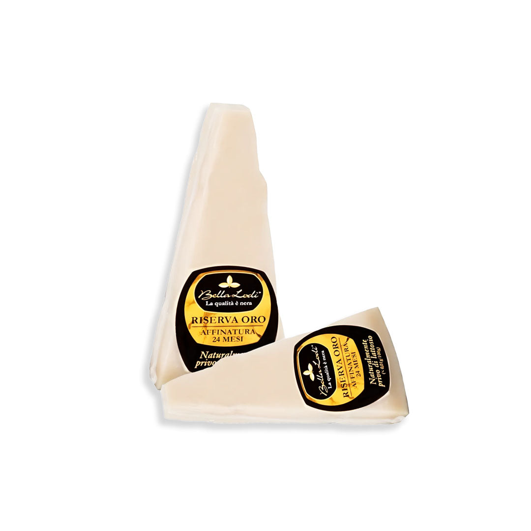 Two pieces of cheese with 'Reserva Oro' labels on a white background