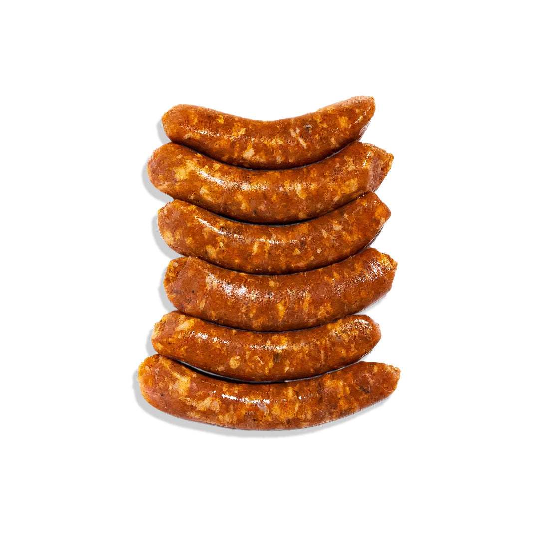 Juicy Breakfast Links Spicy Sausage seasoned with bold spices, 100% natural, no preservatives, perfect for a hearty breakfast