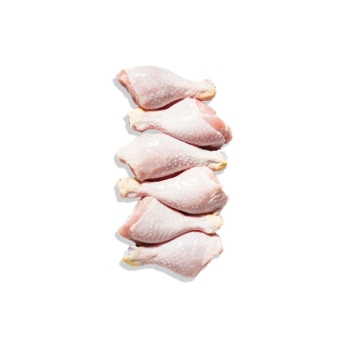 Fresh hormone-free chicken drumsticks ready for roasting or grilling with crispy outside and juicy inside