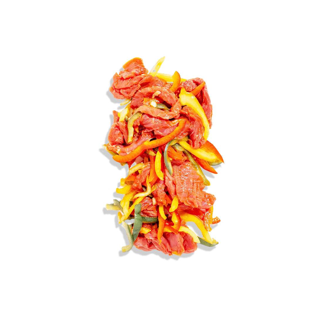 Tender chicken fajita with sautéed peppers and onions served in warm tortillas