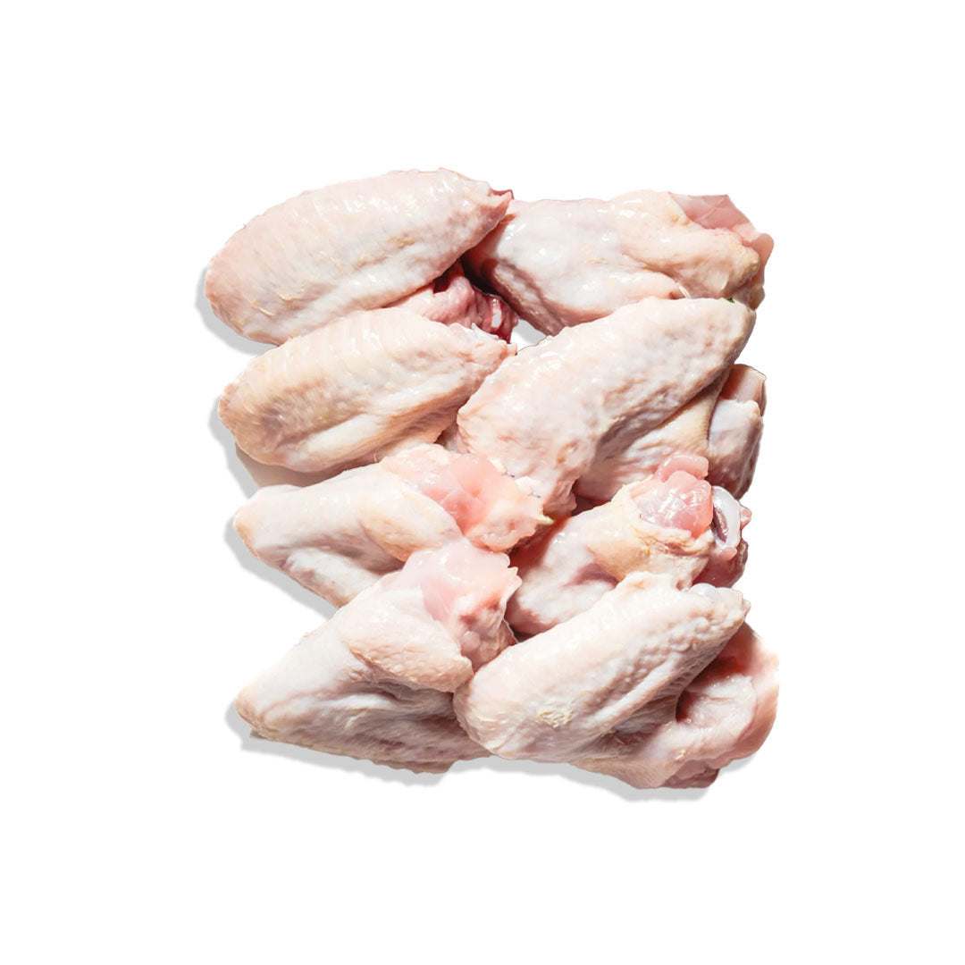 Fresh hormone-free chicken wings ready for grilling or baking