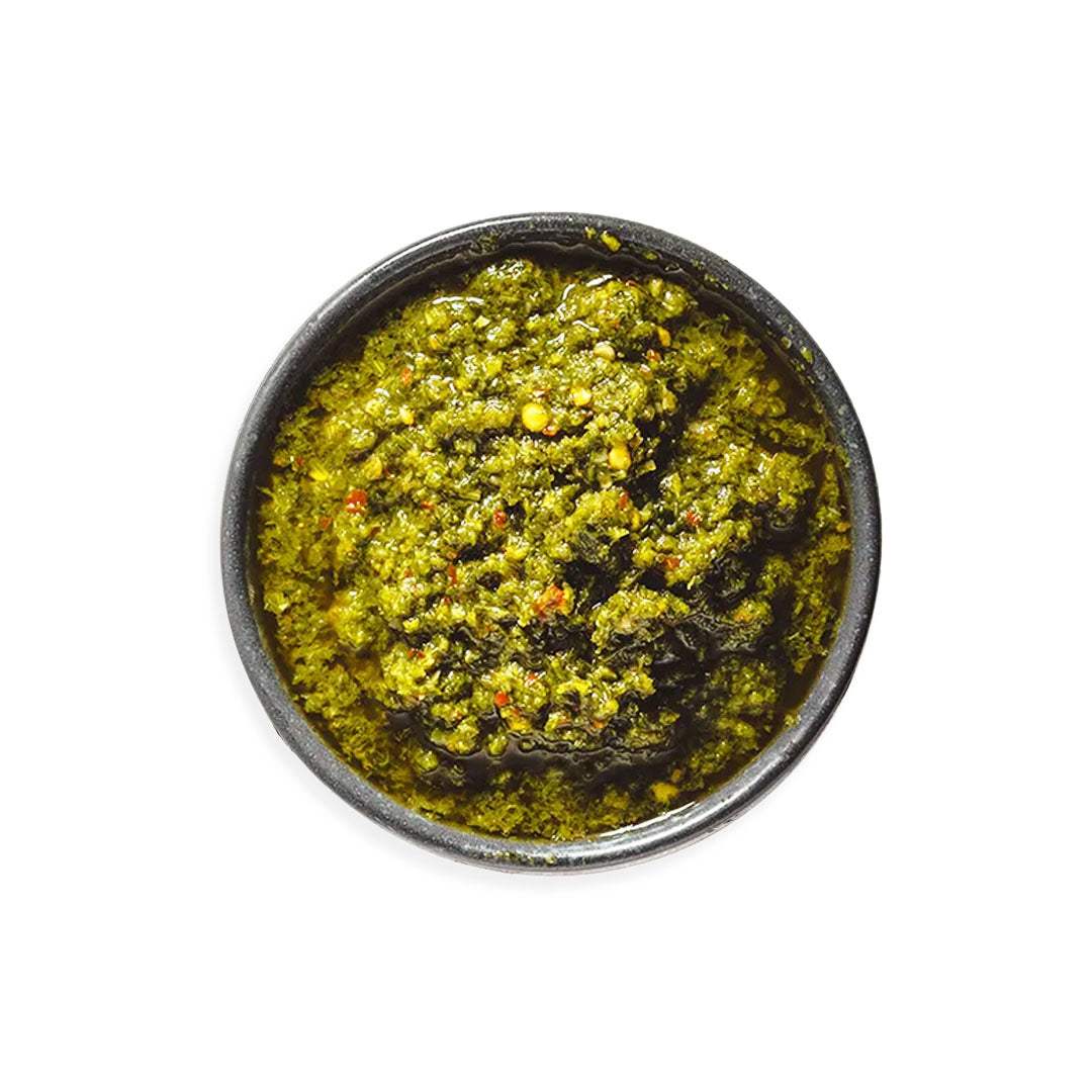 Chimichurri sauce made with fresh parsley, garlic, and olive oil in a bowl