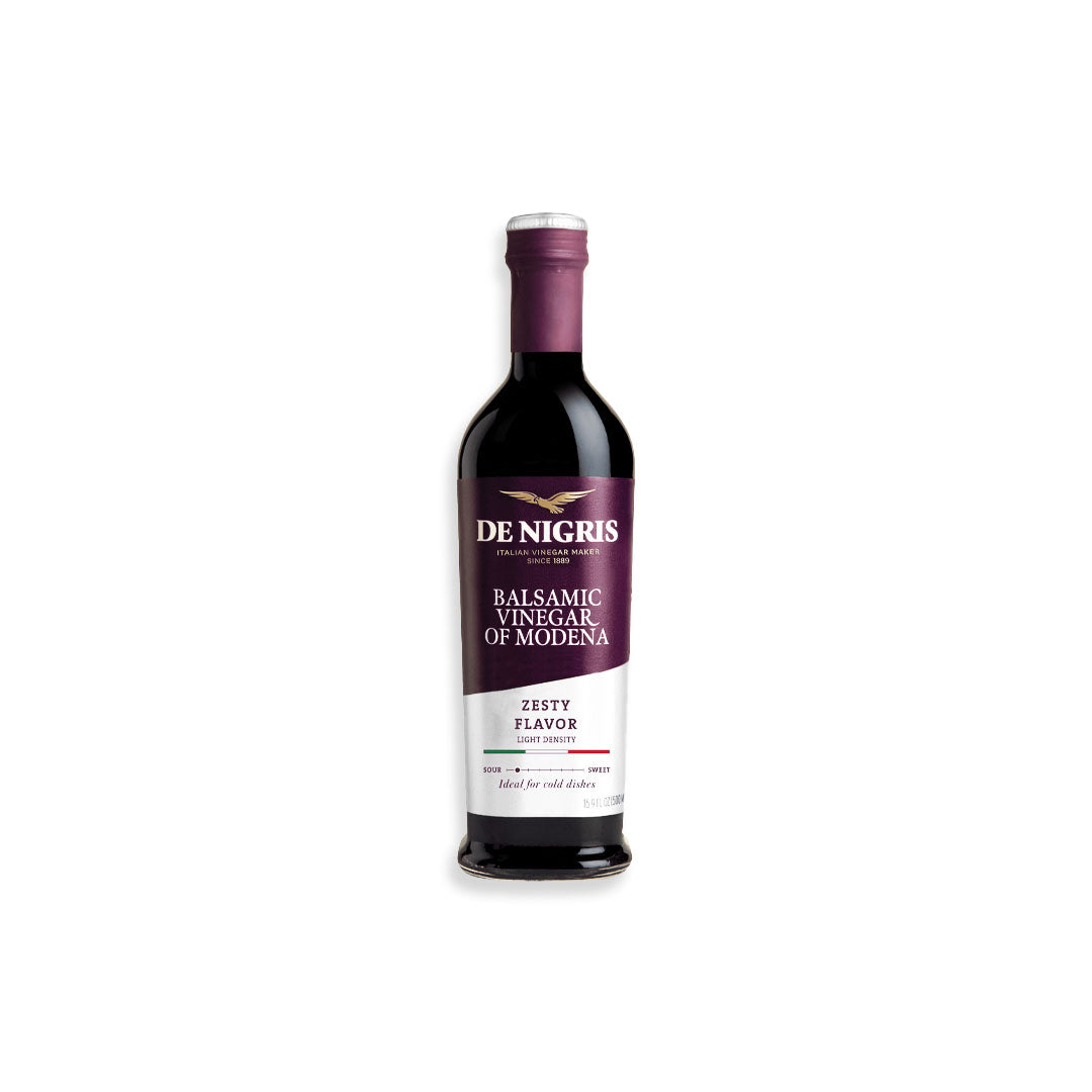Bottle of De Nigris Balsamic Vinegar of Modena on a white background