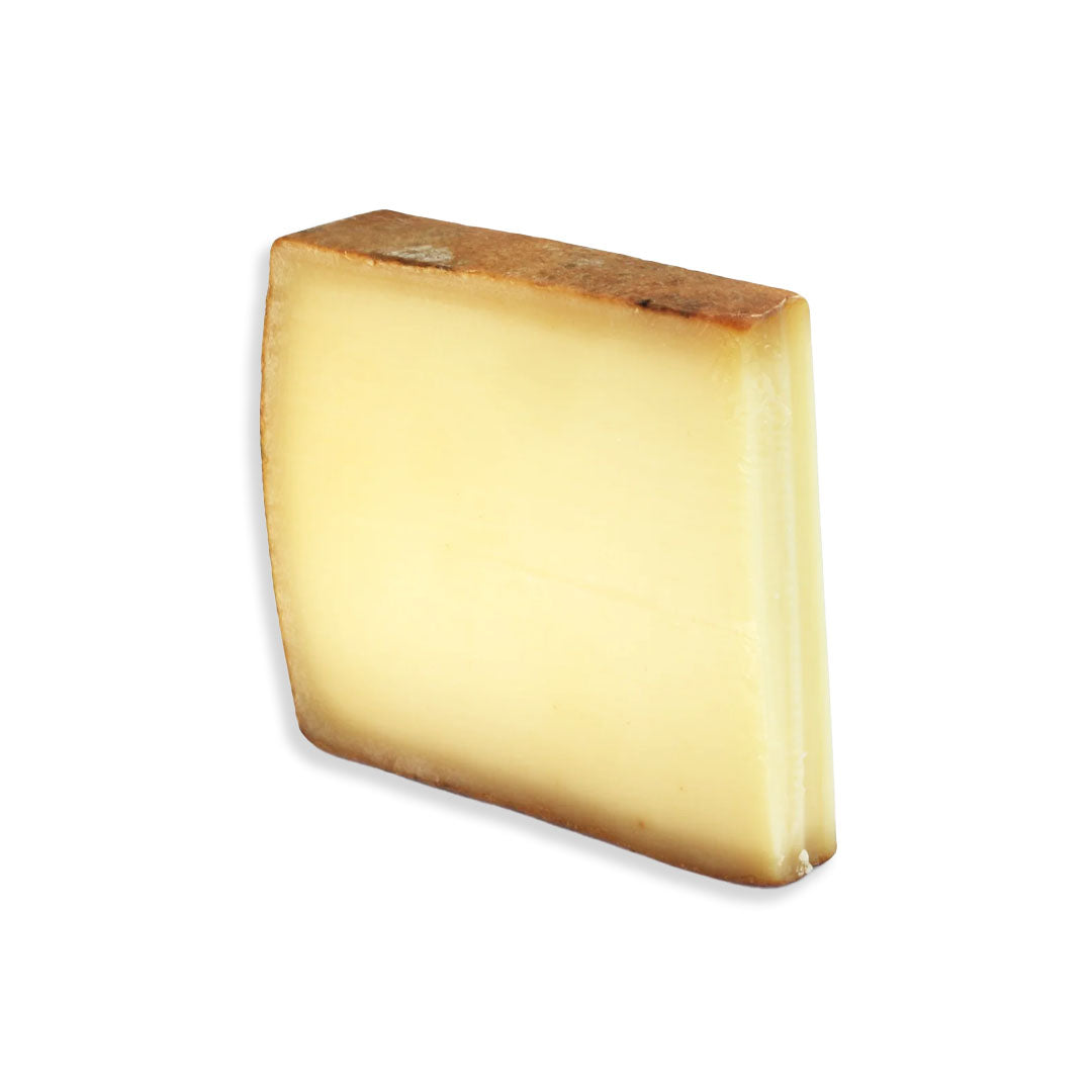 Block of cheese on a white background