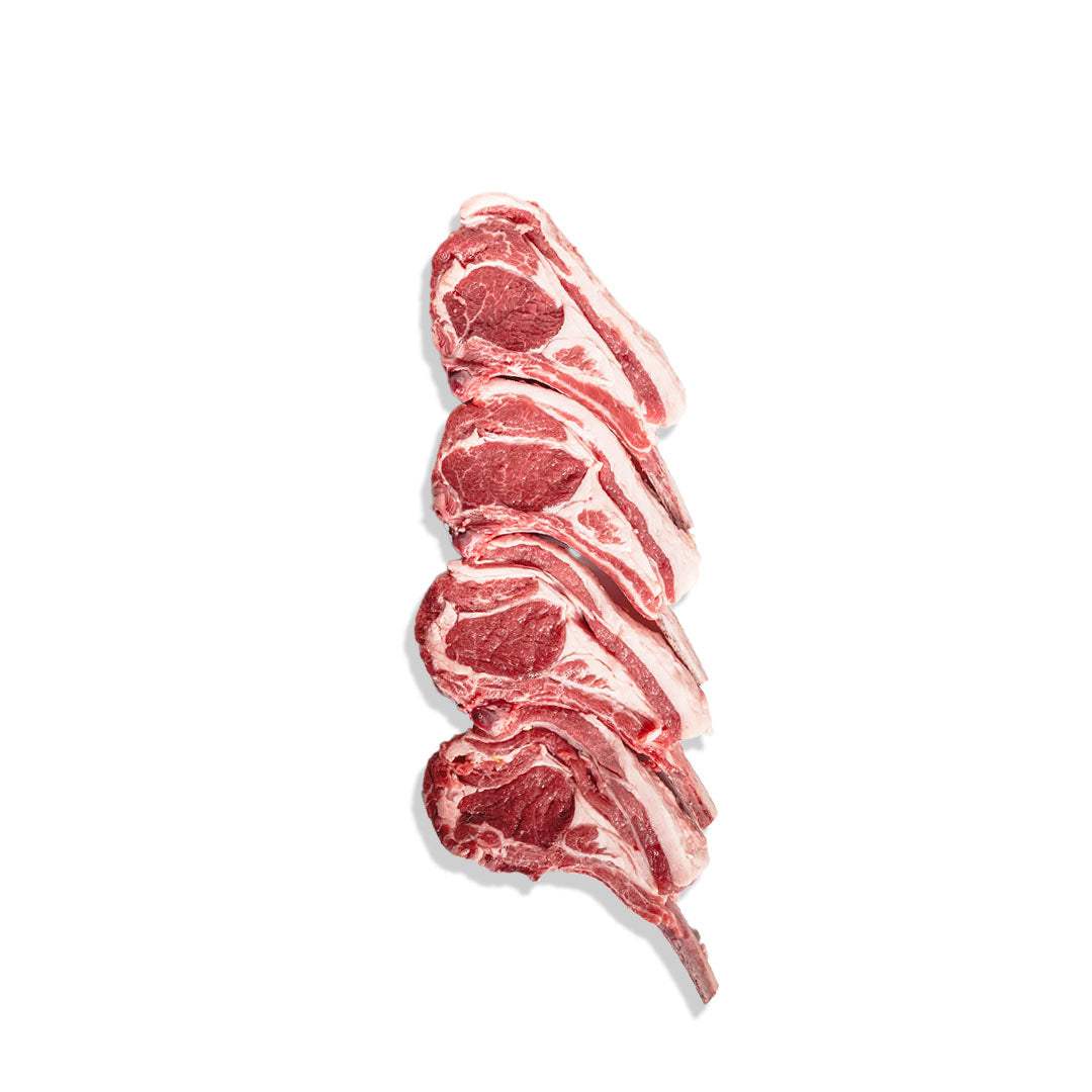 Premium frenched lamb chops seasoned with sea salt and rosemary, ready for grilling or pan-searing.