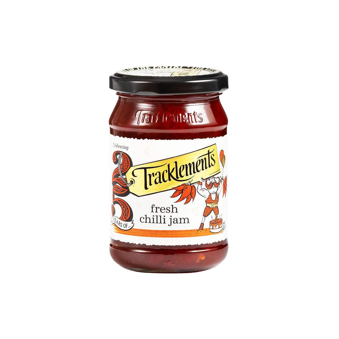 Jar of Fresh Chilli Jam by Tracklements with vibrant red color and smooth texture
