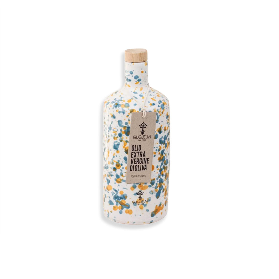 Decorative olive oil bottle with a floral pattern on a white background