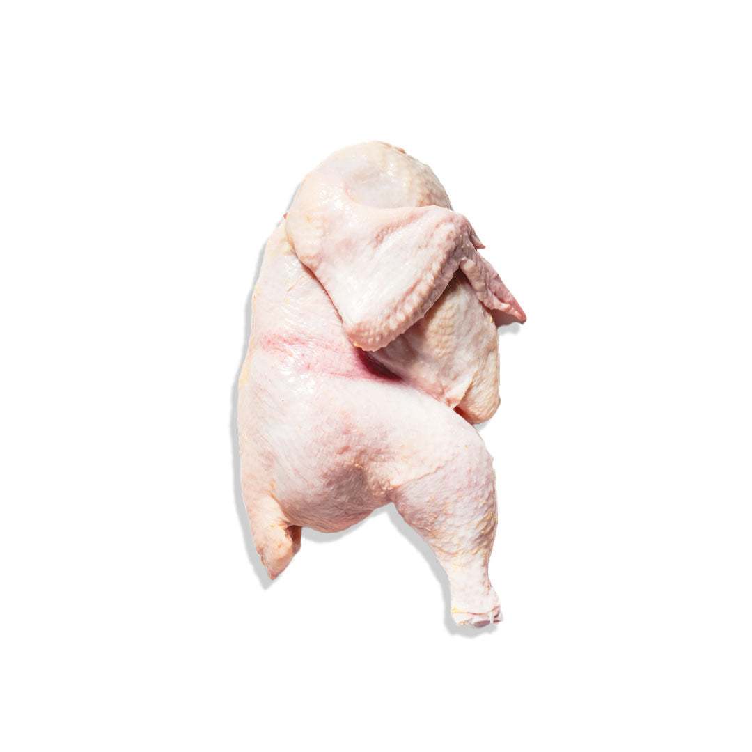 Fresh hormone-free half chicken ready for roasting or grilling