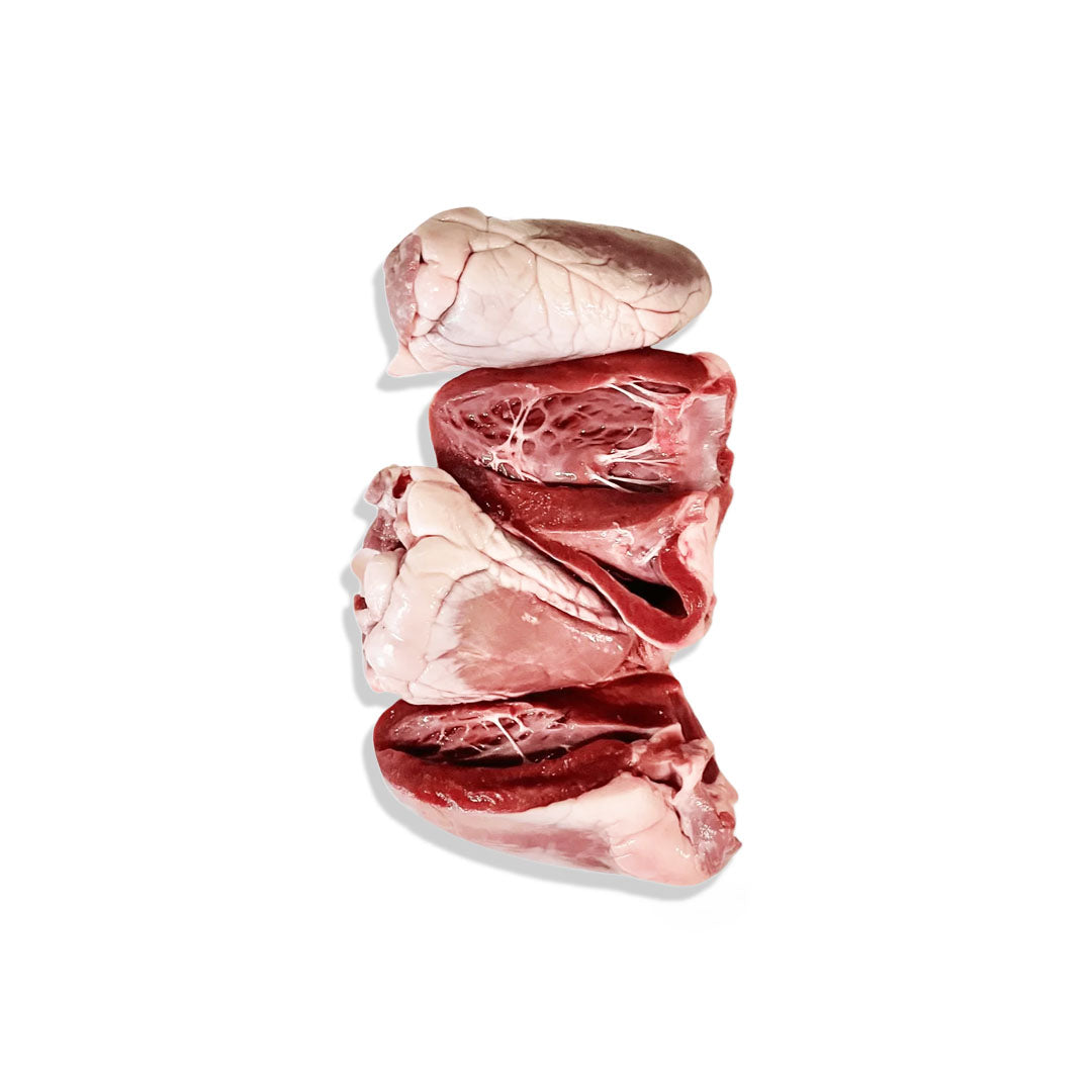 Stack of raw meat on a white background