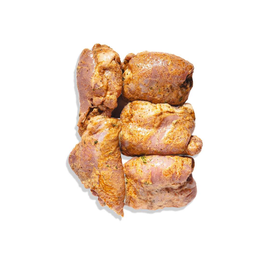 Grilled Mediterranean chicken thighs marinated with herbs and olive oil