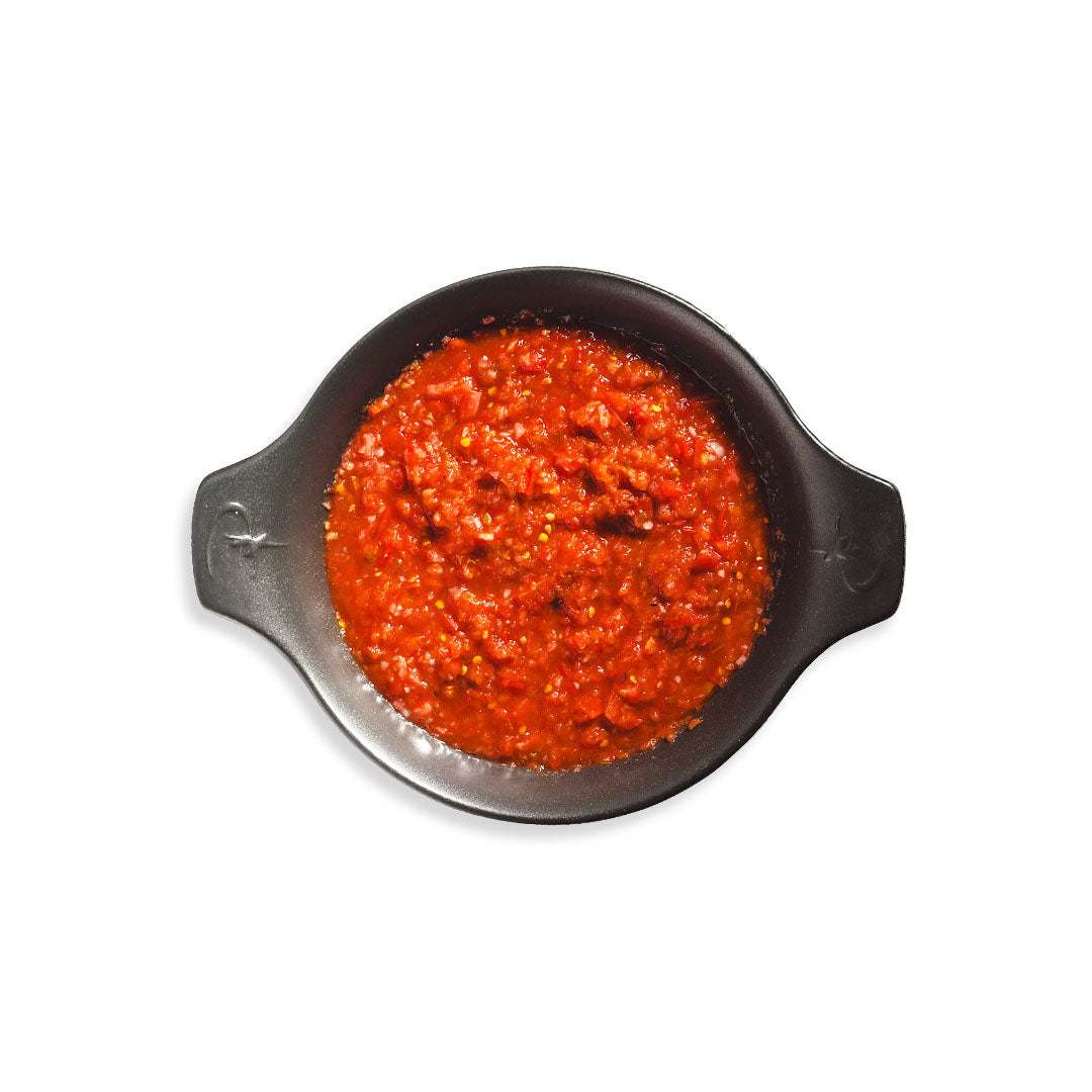 Bowl of fresh Mexican tomato salsa with herbs and spices