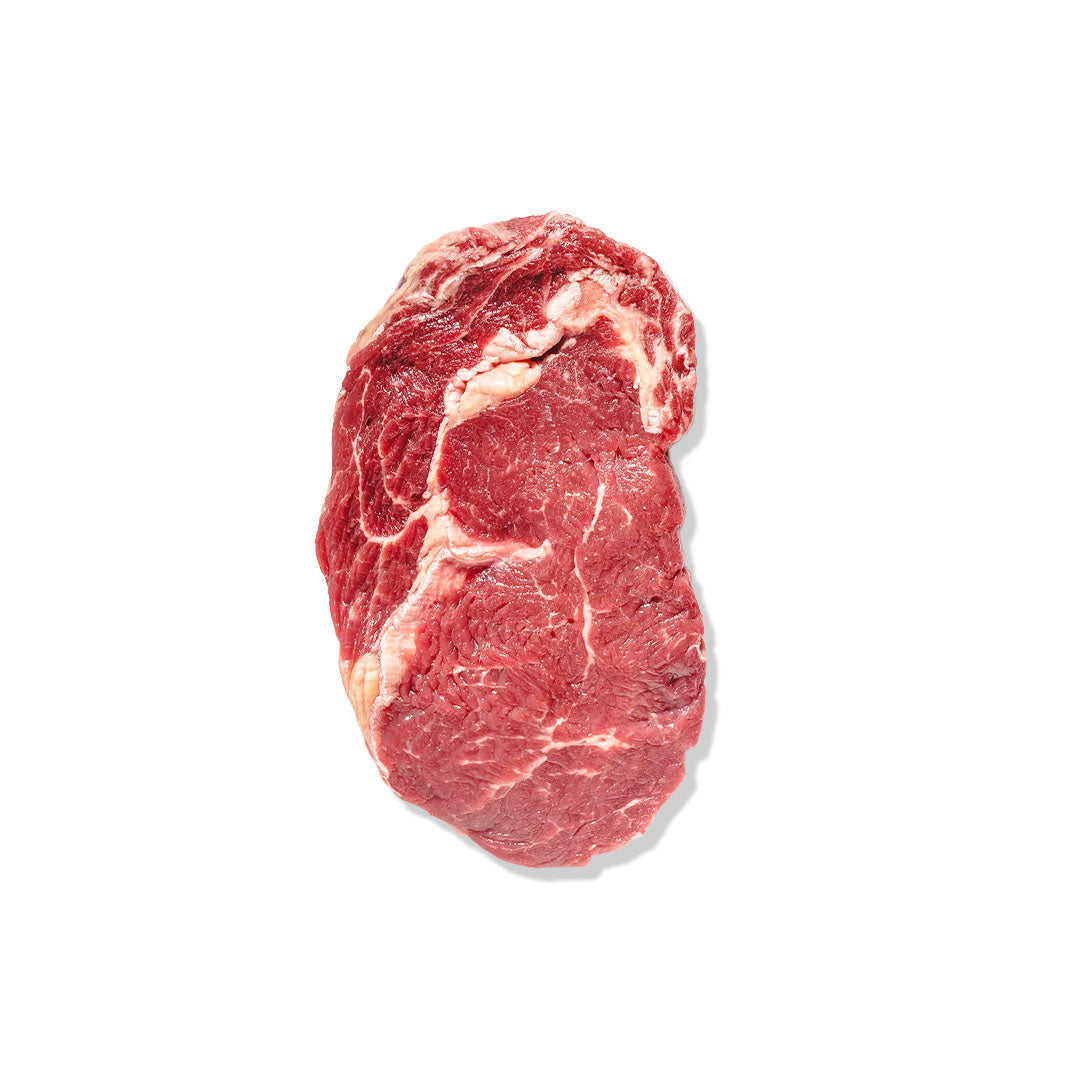 Raw steak on a white background