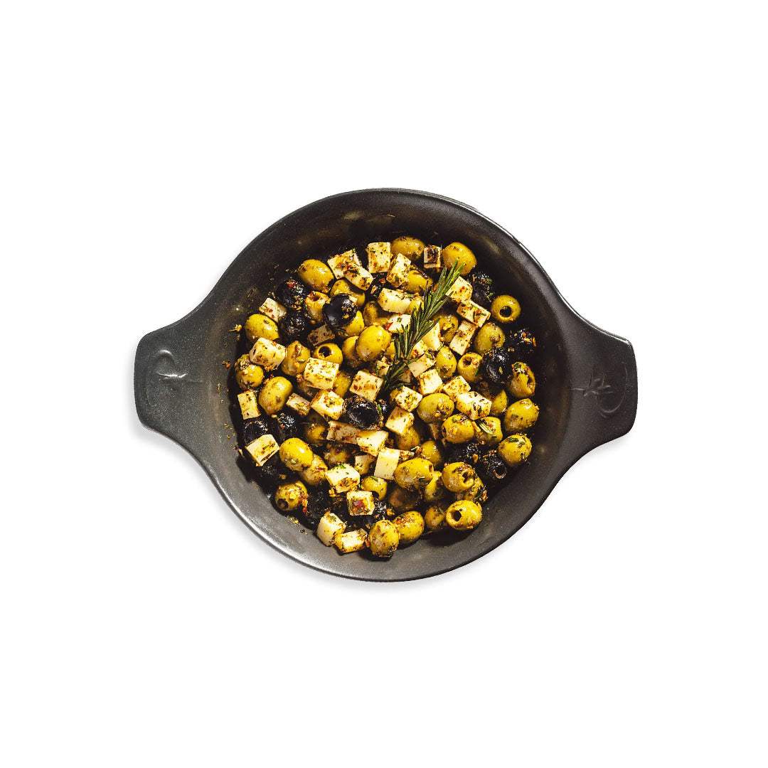Rosemary cheese olives filled with creamy cheese and infused with rosemary on a white dish