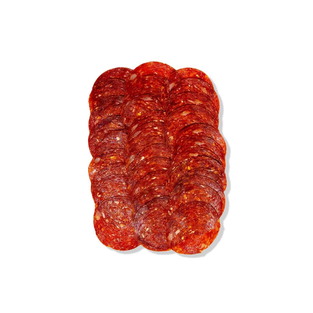 Spicy veal chorizo sausage with paprika and spices, perfect for grilling and serving in tacos or with vegetables