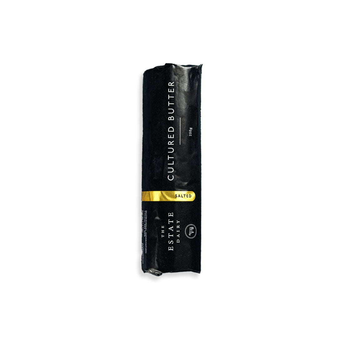 Black packaging of Cultured Butter with visible branding on a white background