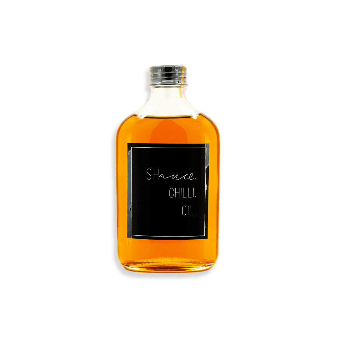 Bottle of Shance Chilli Oil on a white background