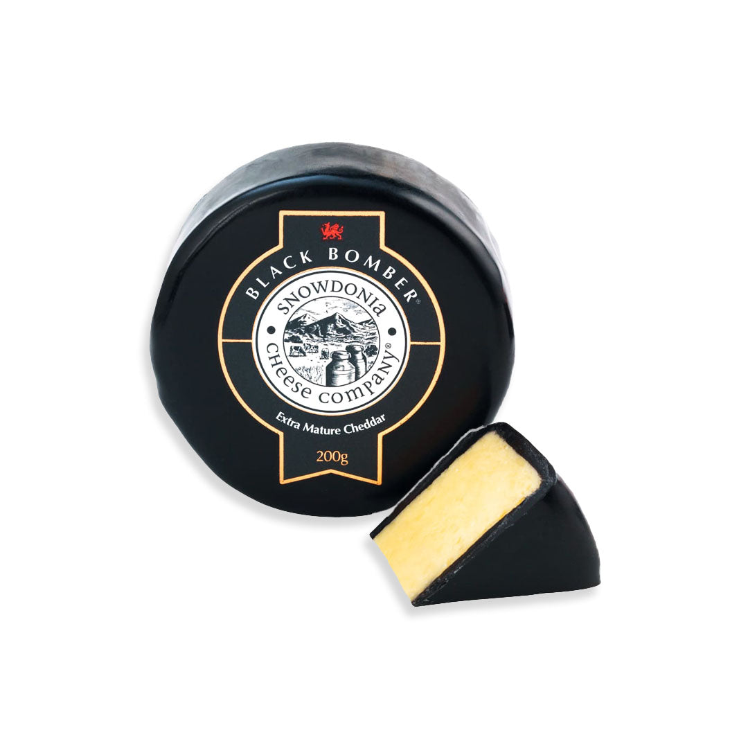 Black Bomber cheese from Snowdonia Cheese Company on a white background