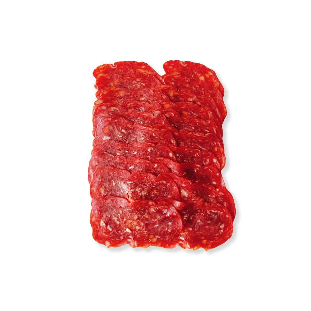 Raw ground beef slices on a white background