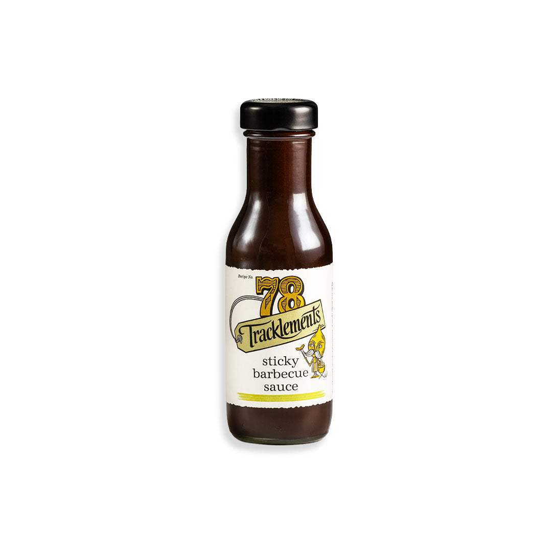 Bottle of sticky barbecue sauce with rich, smoky, and glossy finish perfect for glazing and dipping