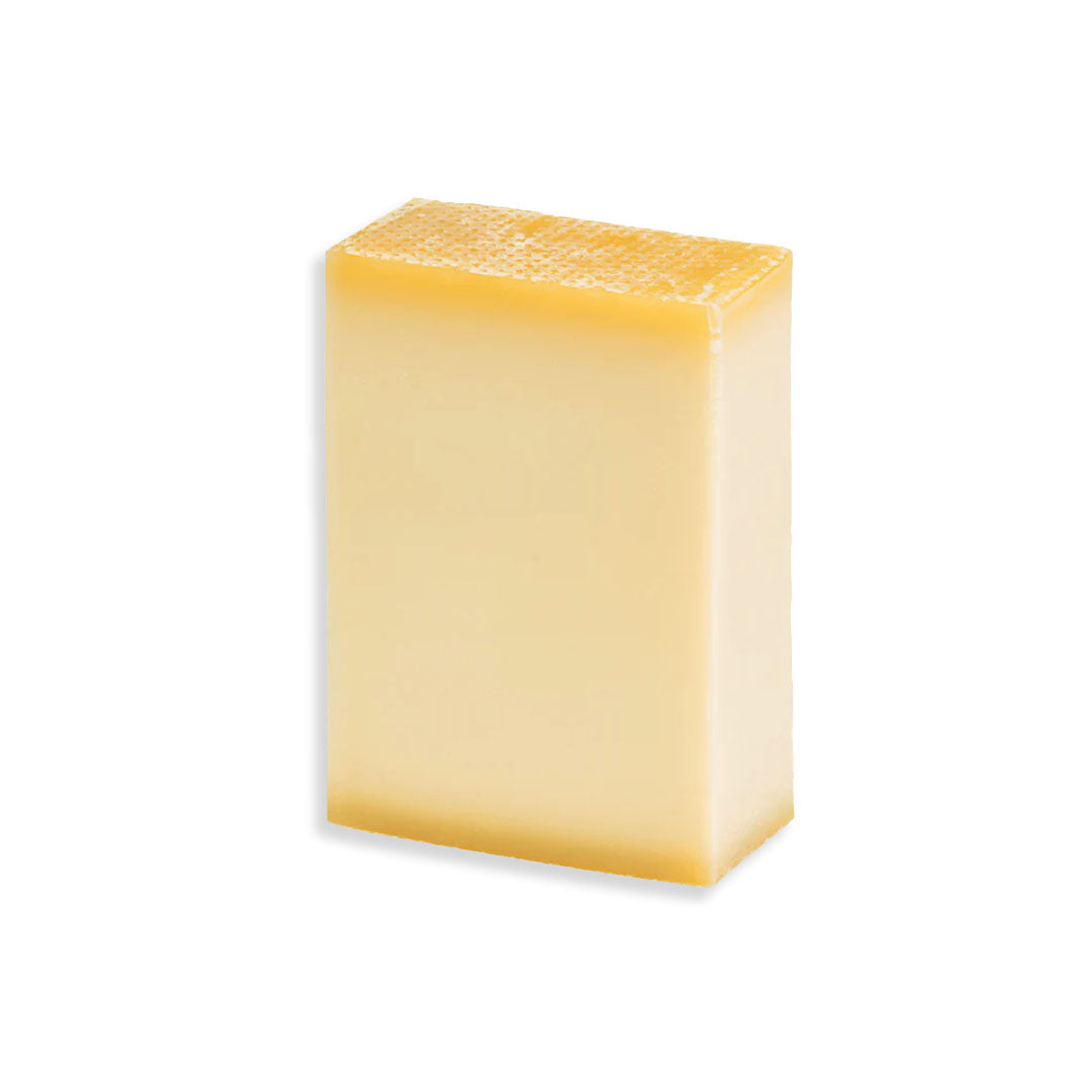 Block of cheese on a white background
