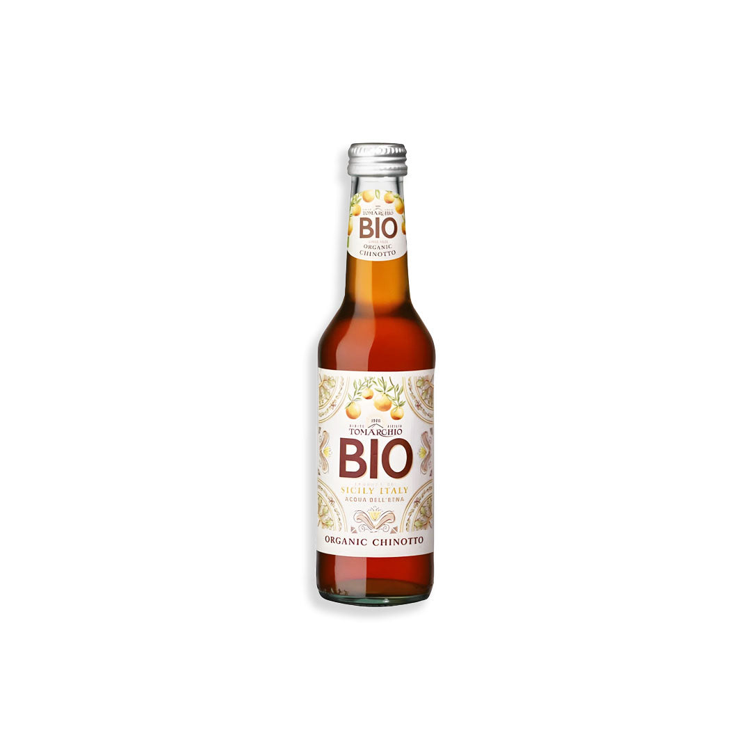 Bottle of organic chinotto liqueur on a white background