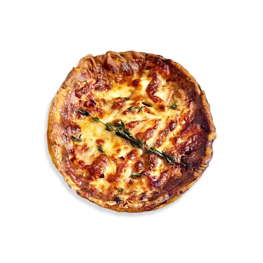 Cheesy tart with herbs on a white background