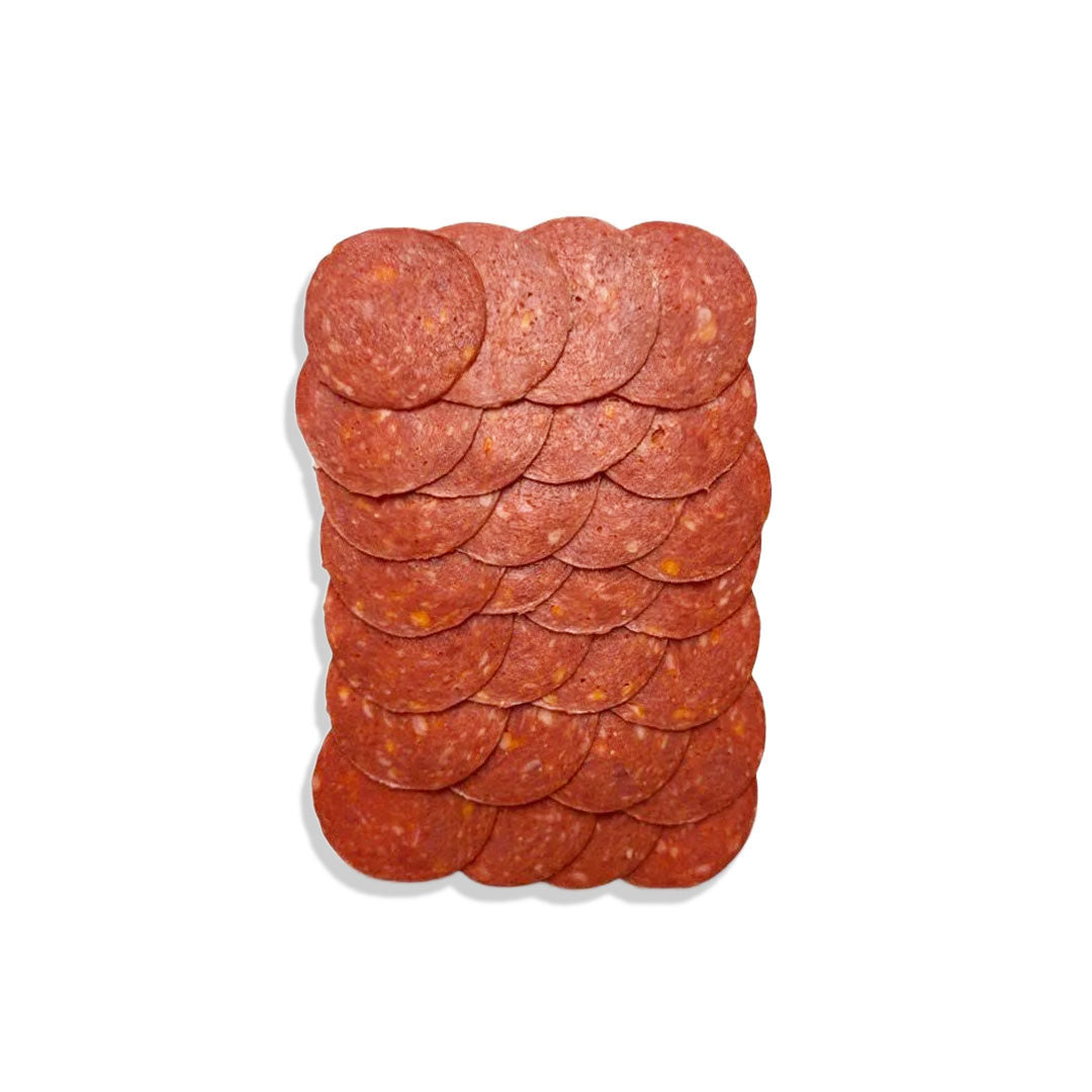 Stack of pepperoni slices on a white background