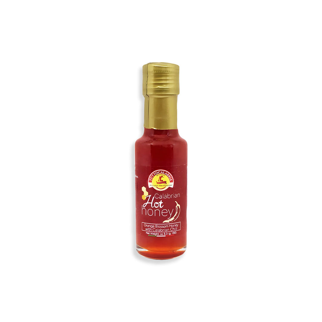 Bottle of Calabrian Hot Honey on a white background