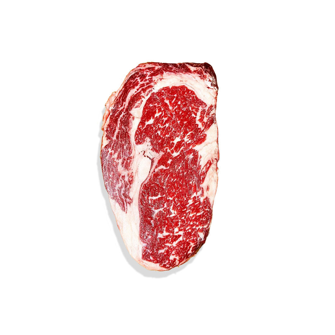 Marbled raw steak on a white background