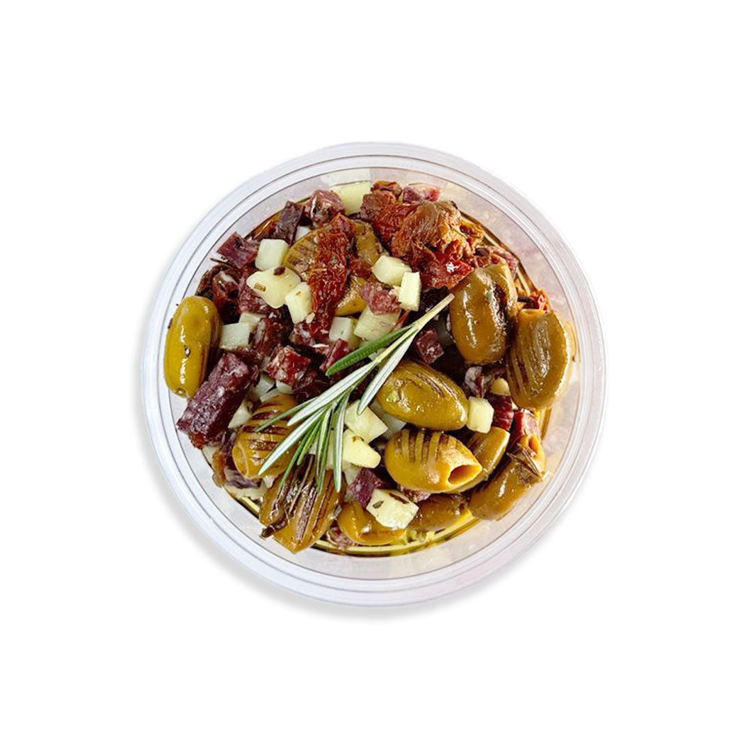 Container of olives and other ingredients on a white background