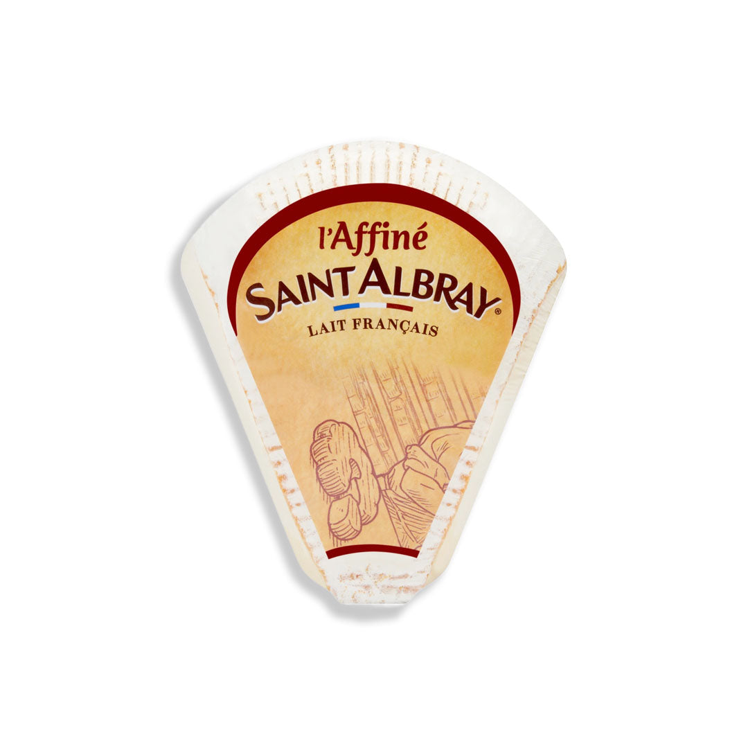 A wedge of l'Affiné Saint Albray Lait Français cheese on a clean white background.