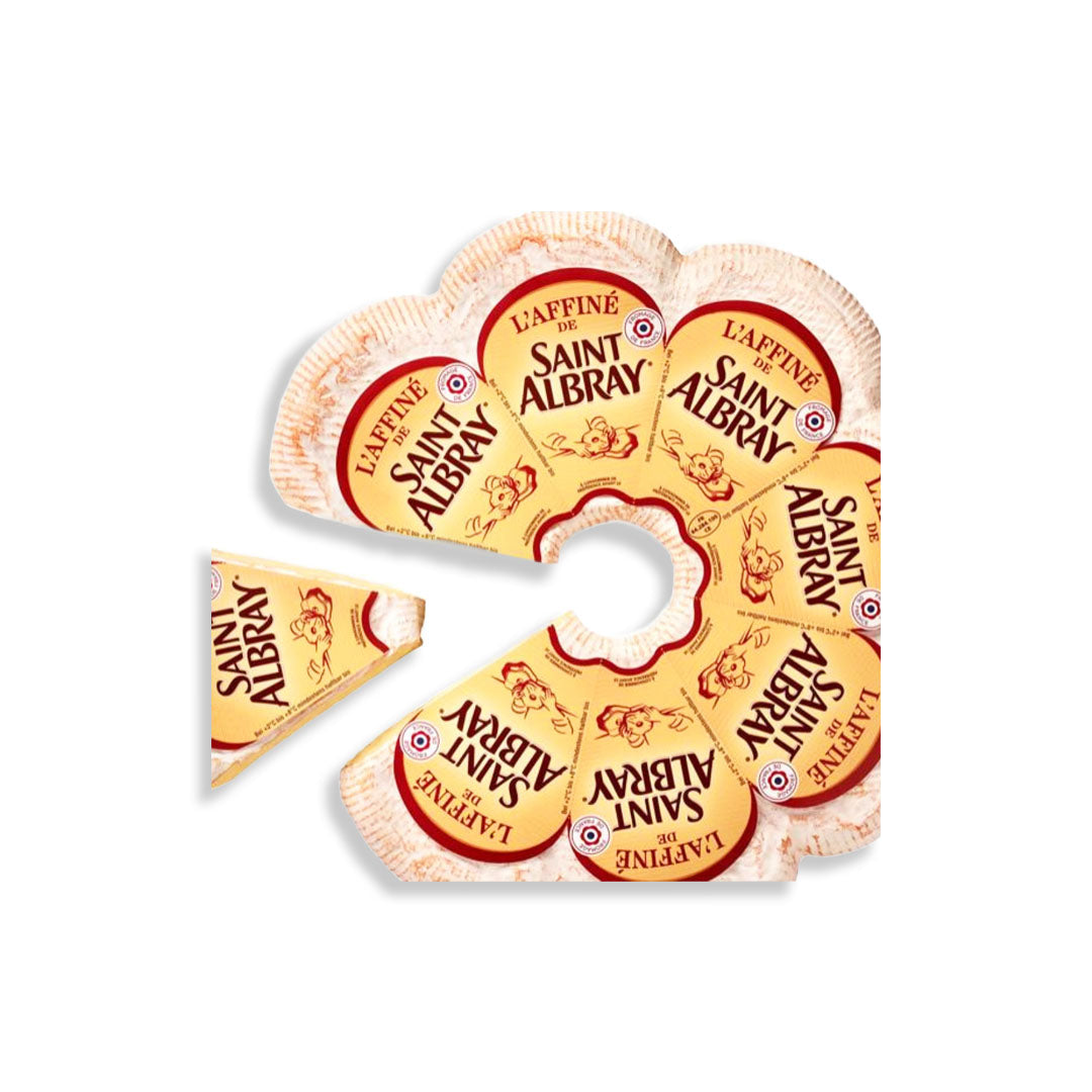 Several slices of Saint-Albray Laffine cheese arranged in a circular pattern on a plain white background, with one slice separated and placed to the left.