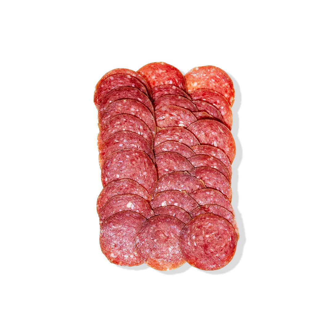 Sliced salami on a white background