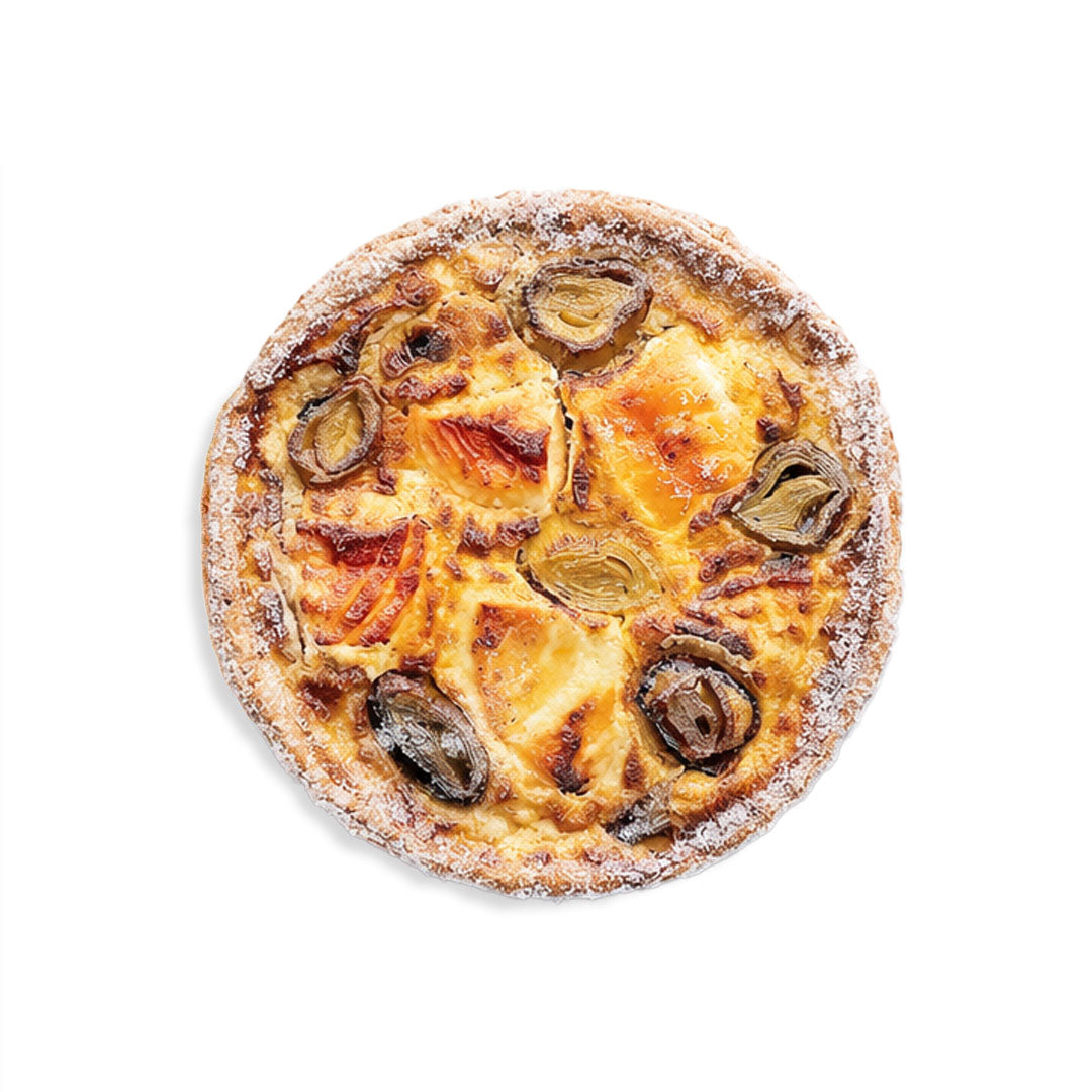 Round baked dish with toppings on a white background