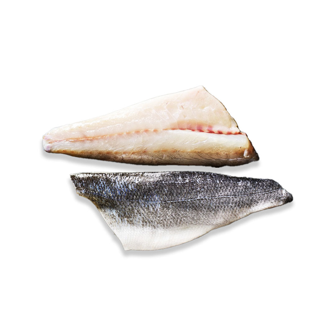 Two fish fillets on a plain white background, one showing the pale flesh side and the other showing the darker scaled skin side.